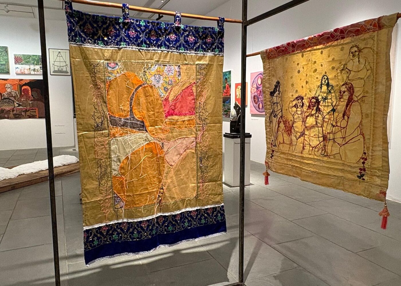Visitors viewing artworks at India Art Fair